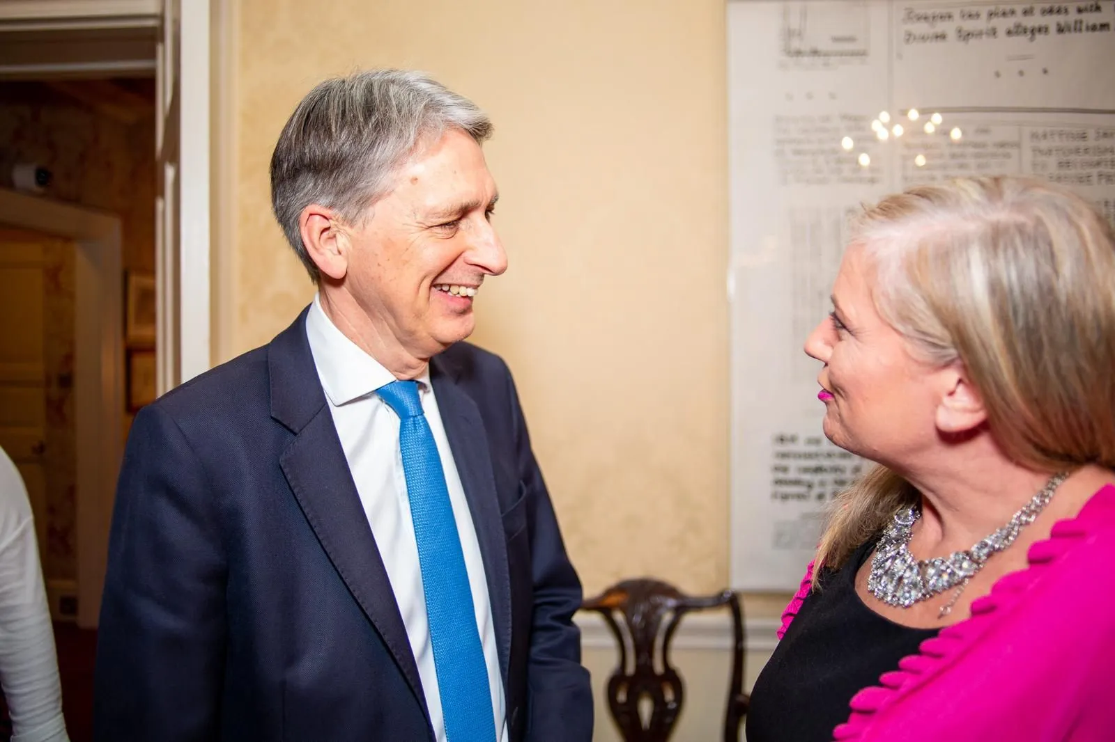 Alison in conversation with Philip Hammond at an enterprise event.